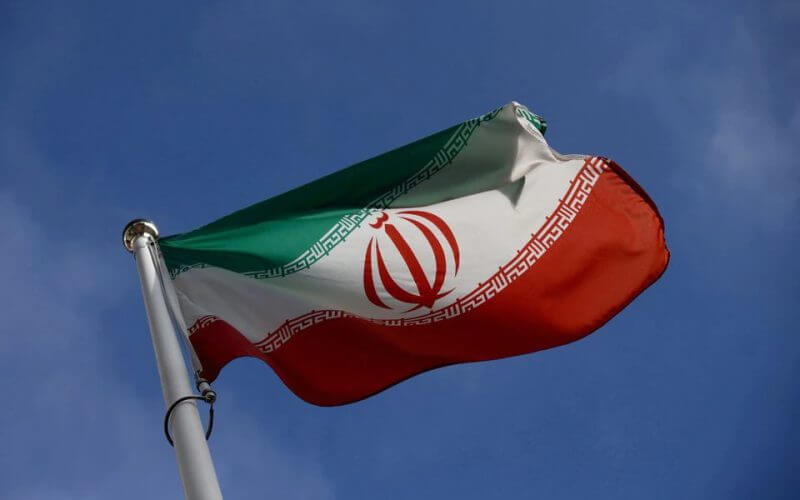 The Iranian flag waves in front of the International Atomic Energy Agency (IAEA) headquarters in Vienna, Austria, March 1, 2021. REUTERS