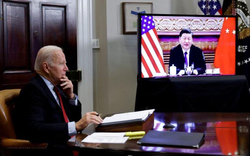 U.S. President Joe Biden speaks virtually with Chinese leader Xi Jinping from the White House in Washington, U.S. November 15, 2021. REUTERS