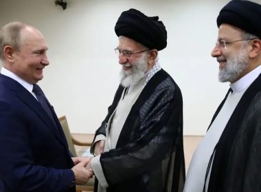 In this picture released by the official website of the office of the Iranian supreme leader, Supreme Leader Ayatollah Ali Khamenei, center, and Russian President Vladimir Putin, left, greet each other as Iranian President Ebrahim Raisi stands at right, during their meeting in Tehran, Iran, Tuesday, July 19, 2022. (Office of the Iranian Supreme Leader via AP)