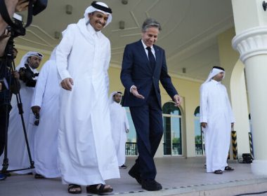 United States Secretary of State Antony Blinken, right, and Qatar Foreign Minister Mohammed Bin Adbulrahman Al Thani, left, walk to a media event at the Diplomatic Club, in November 22, 2022. (AP Photo/Ashley Landis)