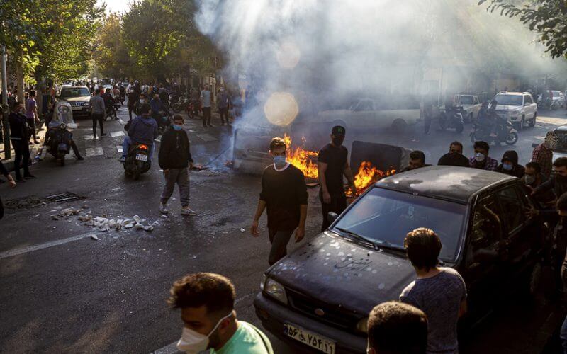 Iranians protest the death of Mahsa Amini after she was detained by the morality police, in Tehran, Oct. 27, 2022. (AP/Middle East Images, File)