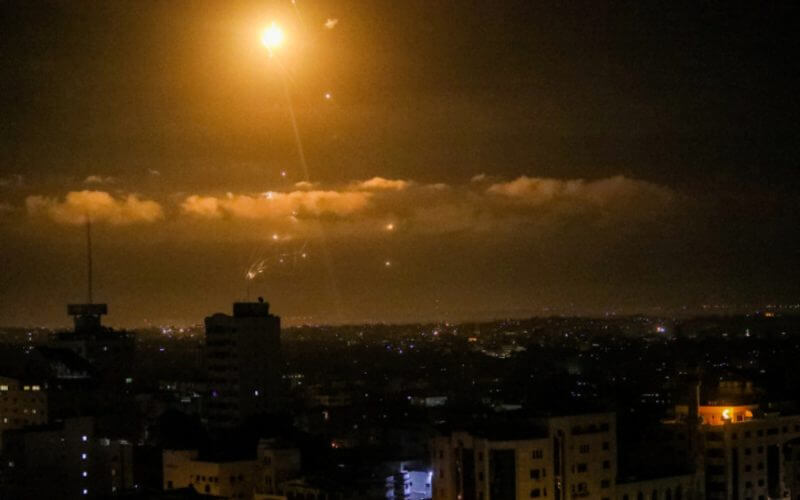 An Iron Dome air defense system launches missiles to intercept rockets fired from the Gaza Strip toward Israel as it seen from Gaza City, April 21, 2022. (Photo: Attia Muhammed/Flash90)