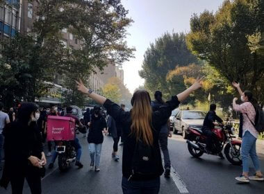 Protesters block a road during a protest over the death of young Iranian woman Mahsa Amini, in Tehran, Iran, Oct. 1, 2022. EPA-EFE/STR