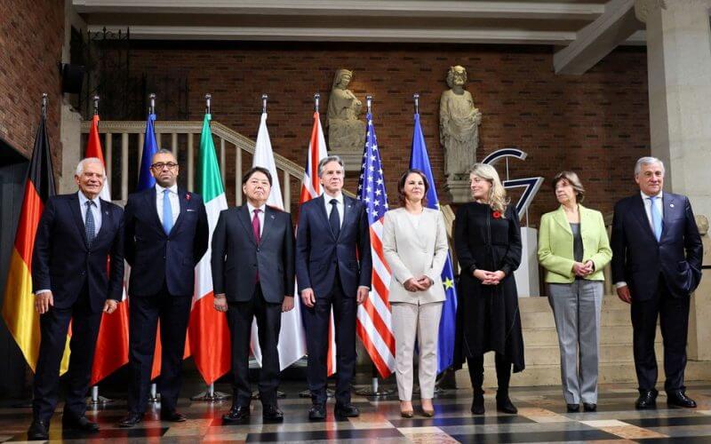 German Foreign Minister Annalena Baerbock poses for a family photo with her counterparts Melanie Joly of Canada, Yoshimasa Hayashi of Japan, Antony Blinken of the U.S., Catherine Colonna of France, James Cleverly of Britain, Josep Borrell of EU and Antonio Tajani of Italy during the first working session of G-7 foreign ministers in Muenster, Germany, November 3, 2022. REUTERS
