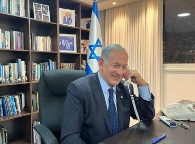 Opposition leader Benjamin Netanyahu speaks to US President Joe Biden, from a Likud office in Tel Aviv on November 7, 2022. (Courtesy Likud)