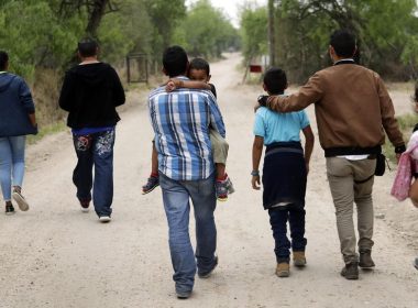 In this file photo, a group of migrant families walk from the Rio Grande, the river separating the U.S. and Mexico in Texas, near McAllen, Texas, March 14, 2019. The number of illegal immigrants nabbed at the southern border rose in February 2022 as single adult Mexicans poured into the country at their highest rate in years, according to new Homeland Security data released Tuesday. (AP Photo/Eric Gay, File)