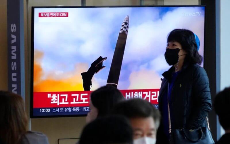 A TV screen shows an image of North Korea's missile launch during a news program at the Seoul Railway Station in Seoul, South Korea, Nov. 19, 2022. AP