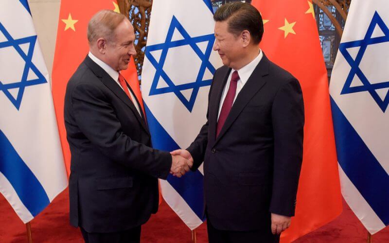 Chinese President Xi Jinping and then-Israeli Prime Minister Benjamin Netanyahu shake hands ahead of their talks at Diaoyutai State Guesthouse in Beijing, China, March 21, 2017. (Photo: REUTERS/Etienne Oliveau/Pool)