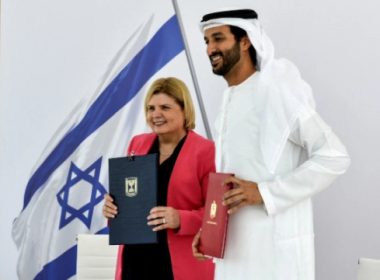 Israel’s Minister of Economy and Industry Orna Barbivai and UAE Minister of Economy Abdulla bin Touq Al Marri present the Free Trade Agreement they signed, which is the first such agreement Israel has with an Arab county, in Dubai, United Arab Emirates May 31, 2022. Anuj Taylor Strap Studios-GPO/Handout via REUTERS