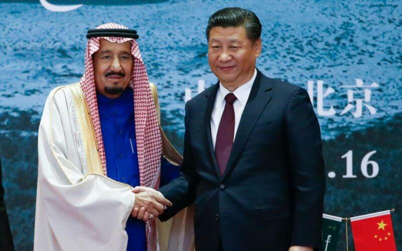 Saudi King Salman, left, and Chinese President Xi Jinping shake hands in Beijing, China, March 16, 2017. AP