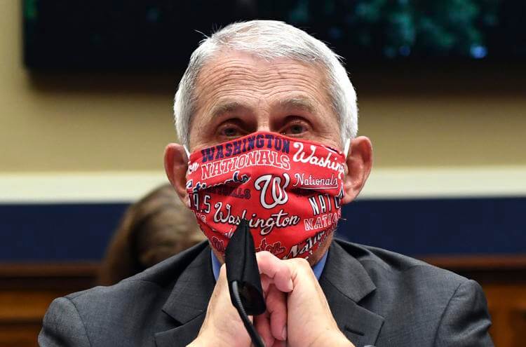 Director of the National Institute of Allergy and Infectious Diseases Dr. Anthony Fauci wears a face mask as he waits to testify before a House Committee on Energy and Commerce on the Trump administration's response to the COVID-19 pandemic on Capitol Hill in Washington on Tuesday, June 23, 2020. Kevin Dietsch/Pool via AP