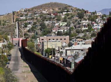 In this April 9, 2018, file photo, the United States - Mexico international border cuts through Nogales, Ariz., from Nogales, Ariz., left, and Nogales, Sonora, Mexico. Matt York / AP