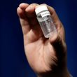 A reporter holds up an example of the amount of fentanyl that can be deadly after a news conference about deaths from fentanyl exposure, at DEA Headquarters in Arlington, Va. Jacquelyn Martin | AP