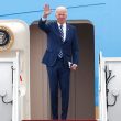 President Joe Biden waves as he boards Air Force One, Tuesday, Dec. 6, 2022, at Andrews Air Force Base, Md. Biden is traveling to Arizona to visit the building site for a new computer chip plant and speak about his economic agenda. (AP Photo/Luis M. Alvarez)