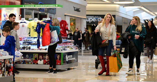 Shoppers carry bags of purchased merchandise at the King of Prussia Mall on December 11, 2022 in King of Prussia, Pennsylvania. cnbc.com