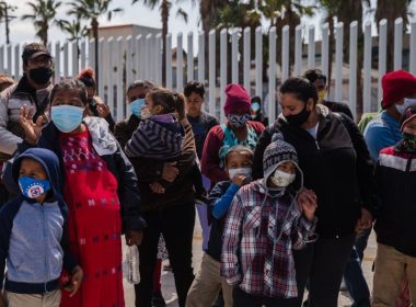 Asylum seekers demonstrate at the San Ysidro border crossing in Tijuana, Mexico on Friday, March 26, 2021. A federal judge upheld an injunction Thursday on Biden's administration's efforts to end the Trump era Remain in Mexico policy. File Photo by Ariana Drehsler/UPI