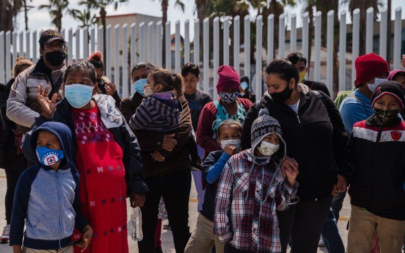 Asylum seekers demonstrate at the San Ysidro border crossing in Tijuana, Mexico on Friday, March 26, 2021. A federal judge upheld an injunction Thursday on Biden's administration's efforts to end the Trump era Remain in Mexico policy. File Photo by Ariana Drehsler/UPI