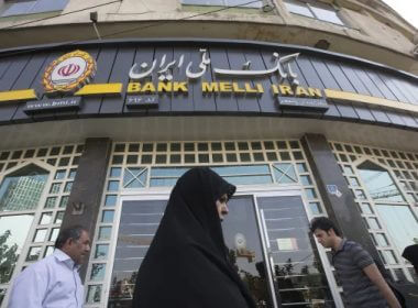 Pedestrians pass a Bank Melli Iran Inc. bank branch in Tehran, Iran, Aug. 22, 2015.Simon Dawson / Bloomberg via Getty Images