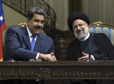 Iranian President Ebrahim Raisi, right, and his Venezuelan counterpart Nicolas Maduro