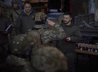 In this photo provided by the Ukrainian Presidential Press Office, Ukrainian President Volodymyr Zelenskyy, right, awards a serviceman at the site of the heaviest battles with the Russian invaders in Bakhmut, Ukraine, Tuesday, Dec. 20, 2022. (Ukrainian Presidential Press Office via AP)