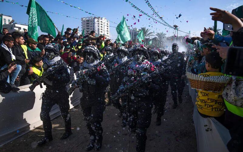 Members of the Izz ad-Din al Qassam Brigades, the armed wing of the Palestinian group Hamas, parade in Gaza, December 14, 2022. AP