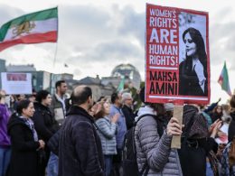 Demonstrators march in solidarity with protesters in Iran on October 15, 2022 in Berlin, Germany. | Omer Messinger/Getty Images
