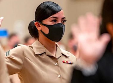 Marine Corps Cpl. Nicole Segarra takes the Oath of Allegiance during a naturalization ceremony at Camp Foster, Okinawa, Japan, July 1, 2021. (U.S. Marine Corps photo by Cpl. Terry Wong)