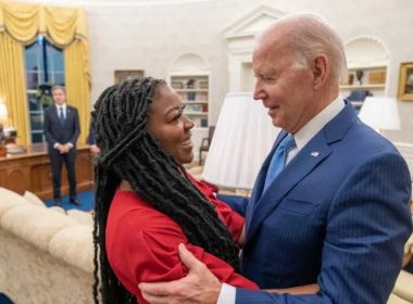 U.S. President Joe Biden is seen hugging Cherelle Griner in this White House handout photo taken in the Oval Office, after the release of her wife, WNBA basketball star Brittney Griner by Russia, as U.S. Secretary of State Antony Blinken looks on at the White House. Reuters