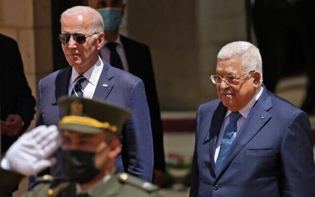 US President Joe Biden (L) is received by Palestinian Authority President Mahmoud Abbas in Bethlehem in the West Bank on July 15, 2022. (Ahmad Gharabli/AFP)