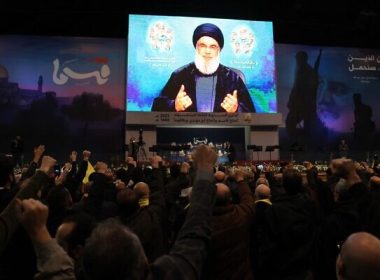 Supporters of Hezbollah attend a televised speech by the group's leader Hassan Nasrallah in the Lebanese capital Beirut on January 3, 2023. (Anwar Amro/AFP)