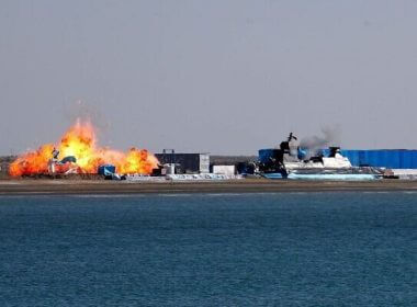 An explosive-laden drone slams into a mock Israeli Navy base during a drill in Iran, December 31, 2022. (IRNA)