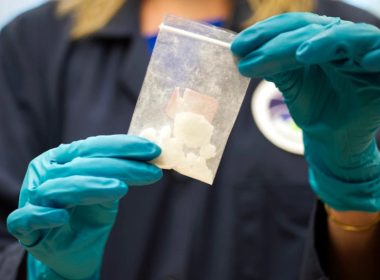 A bag of 4-fluoro isobutyryl fentanyl, seized in a drug raid, is displayed at the U.S. Drug Enforcement Administration laboratory in Sterling, Virginia, Aug. 9, 2016. The U.S. is looking to reengage with China to stop the flow of illicit synthetic drugs into the U.S. AP