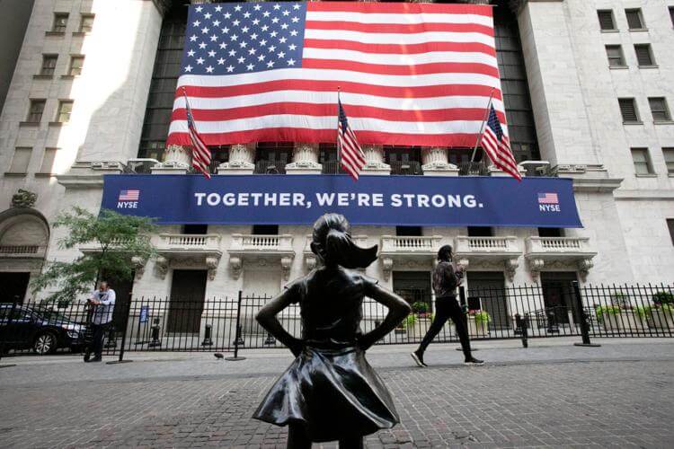 The Fearless Girl statue stands in front of the New York Stock Exchange, Thursday, July 9, 2020, in New York. Mark Lennihan / AP photo