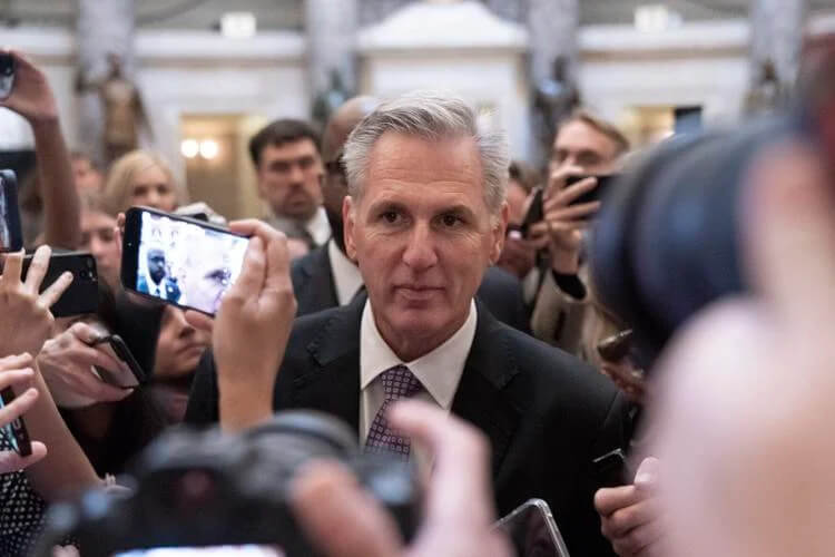 U.S. Rep. Kevin McCarthy, R-Calif., is surrounded by reporters as he walks to the House floor from the Speakers Office, Wednesday, Jan. 4, 2023, on Capitol Hill in Washington. Jacquelyn Martin | AP