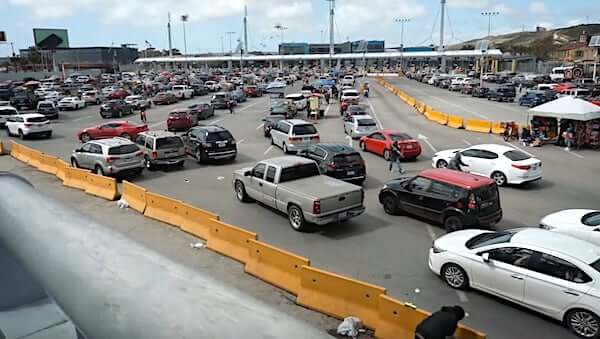 Cars line up in lanes at the border crossing between Tijuana, Mexico, and San Ysidro, California, in April 2022. (Video screenshot)
