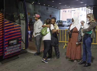 A bus of migrants detained at the Texas border arrives at the Port Authority Bus Terminal in midtown New York City on September 25. On Friday, October 7, New York City Mayor Eric Adams said that the city is facing a "crisis" situation amid the influx of migrants. Getty