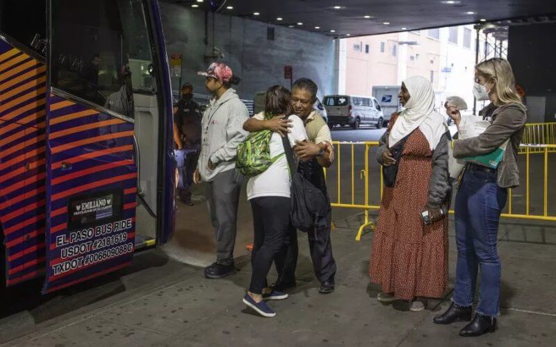A bus of migrants detained at the Texas border arrives at the Port Authority Bus Terminal in midtown New York City on September 25. On Friday, October 7, New York City Mayor Eric Adams said that the city is facing a "crisis" situation amid the influx of migrants. Getty
