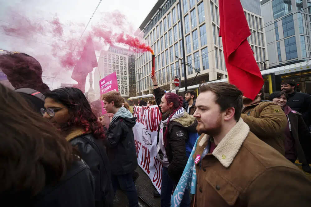 A demonstration in support of strikers is seen in central Manchester, England, Wednesday, Feb. 1, 2023. AP