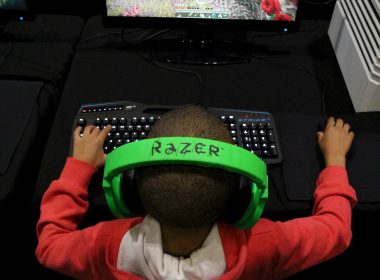 A child plays video game Minecraft at the Minecon convention in London July 4, 2015. REUTERS