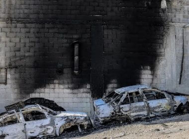 A view of torched cars and a building in the town of Huwara near Nablus in the West Bank. AFP