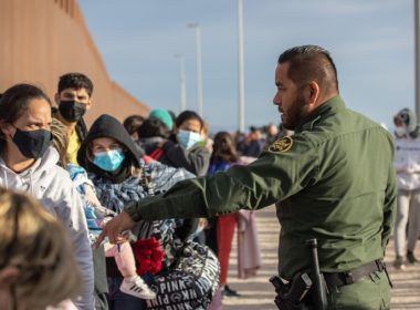 Illegal immigrants' families are taken into custody by U.S. Border Patrol agents at the U.S.–Mexico border in Yuma, Ariz., on Dec. 7, 2021. (John Moore/Getty Images)