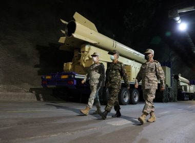 Iranian Armed Forces Chief of Staff Major General Mohammad Bagheri and IRGC Aerospace Force Commander Amir Ali Hajizadeh walk during the unveiling of "Kheibarshekan" missile at an undisclosed location in Iran, in this picture obtained on February 9, 2022. IRGC/WANA (West Asia News Agency)/Handout via REUTERS