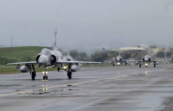 Taiwanese Mirage 2000 fighter jets taxi along a runway during a drill at an airbase in Hsinchu, Taiwan, Wednesday, Jan. 11, 2023. AP