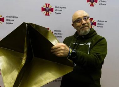 Ukraine's Defense Minister, Oleksii Reznikov, poses with a reflector similar to the one the air force says it shot down from the balloons. Ukraine Defense Ministry