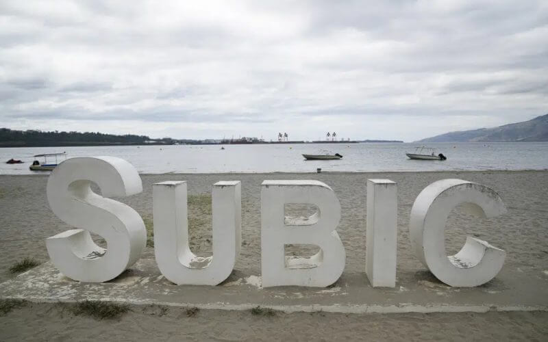 A sign stands on a quiet day in what used to be AmericaÅfs largest overseas naval base at the Subic Bay Freeport Zone, Zambales province, northwest of Manila, Philippines on Monday Feb. 6, 2023. AP