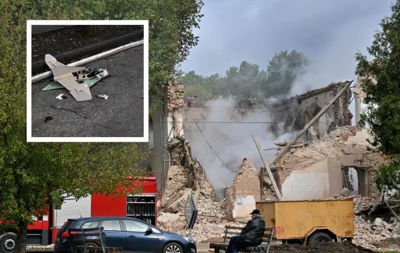 A local resident sits outside a building destroyed by Russian forces using Iranian-made drones after an airstrike on Bila Tserkva, southwest of Kyiv, Ukraine, on October 5, 2022. SERGEI SUPINSKY/AFP; ARIS MESSINIS / AFP/GETTY IMAGES