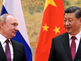 Chinese President Xi Jinping and Russian President Vladimir Putin talk to each other during their meeting in Beijing, China, on Feb. 4, 2022. AP