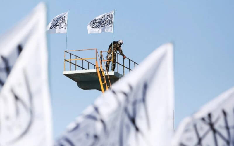 A Taliban fighter is seen at the Taliban flag-raising ceremony in Kabul, Afghanistan, March 31, 2022. Reuters
