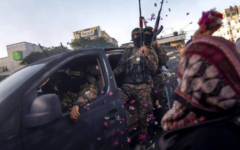 Islamic Jihad militants take part in an anti-Israel rally in Rafah, Gaza Strip. AP
