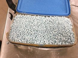 This photo provided by the U.S. Drug Enforcement Administration's Phoenix Division shows one of four containers holding some of the 30,000 fentanyl pills the agency seized in one of its bigger busts in Tempe, Arizona. The problem of fentanyl trafficking is nationwide, with Spokane County in Washington state one of the federal Drug Enforcement Administration's 11 focus areas for sales and use of the dangerous substance. HOGP/AP Images